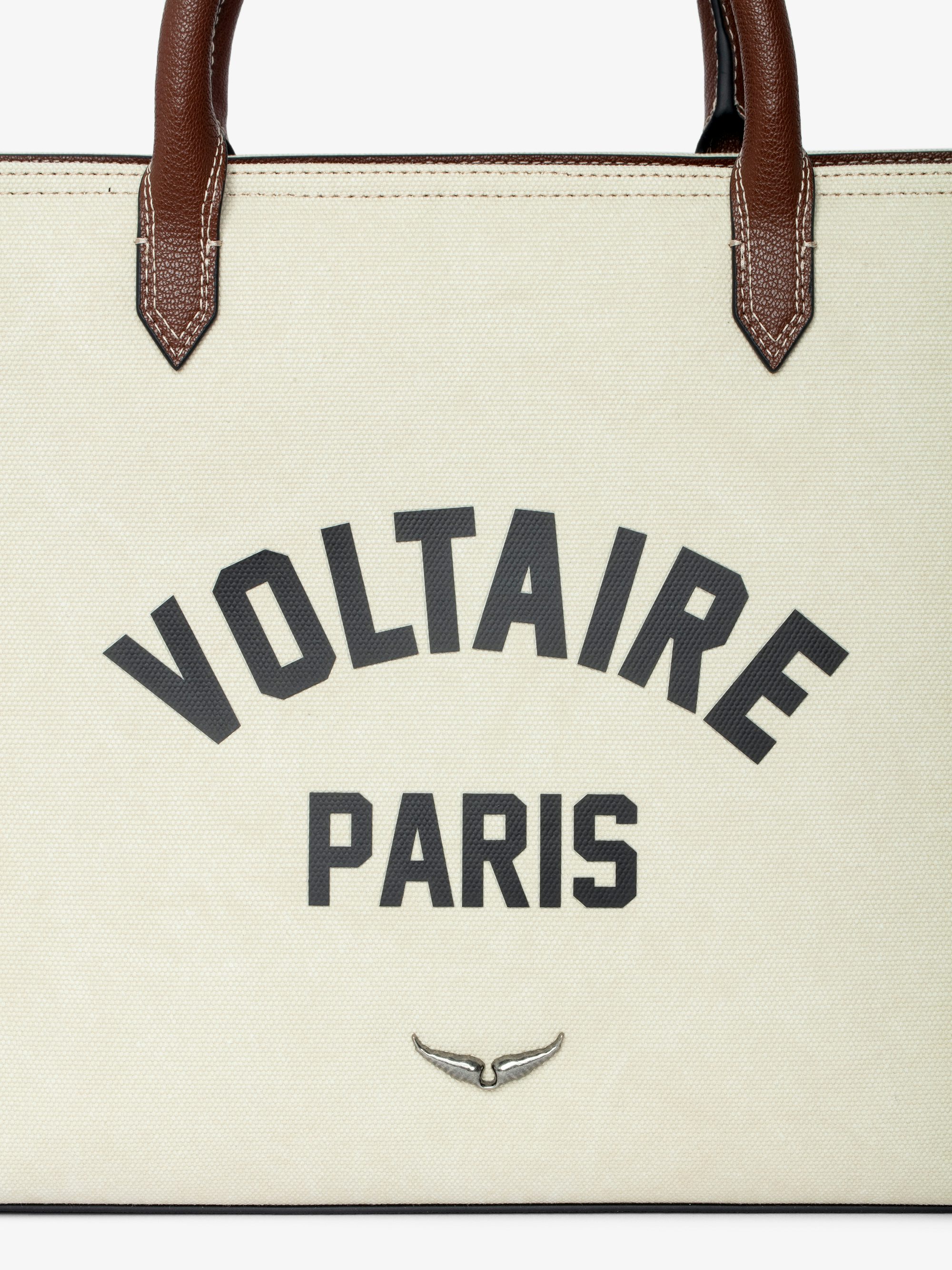 Angel Tote - Canvas and grained leather tote bag with double handles, shoulder strap and wing signature.